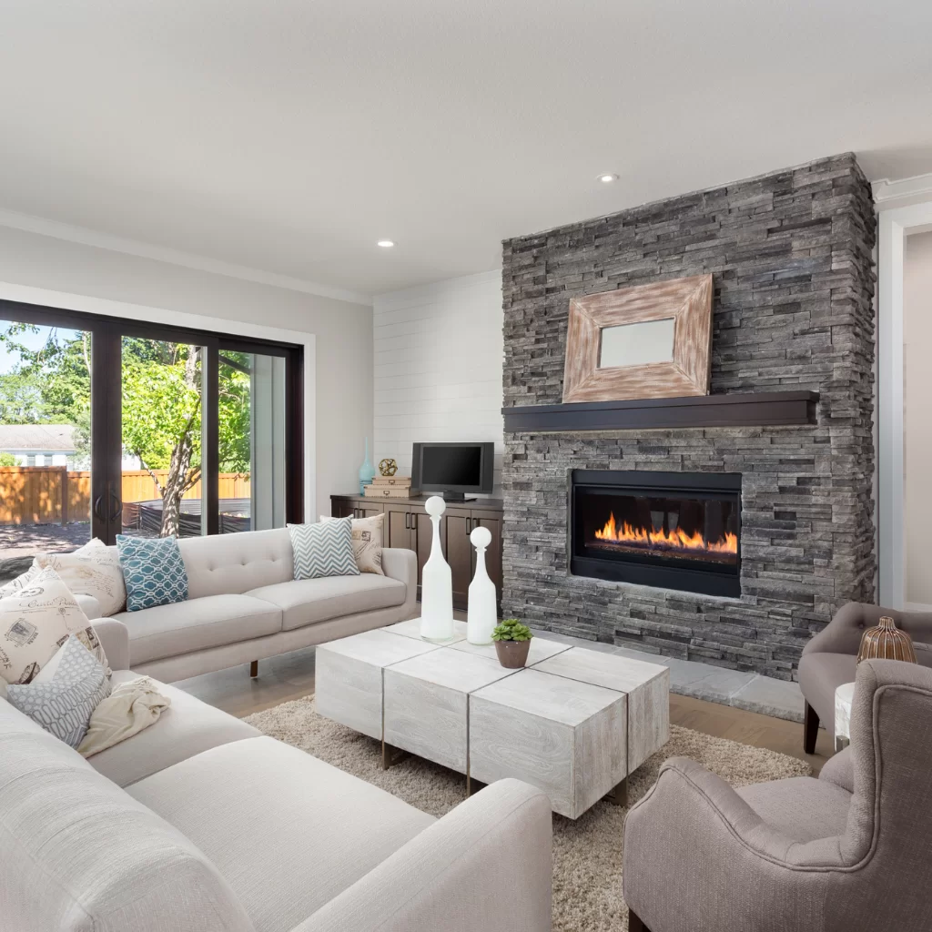 Modern living room with sleek built-in electric fireplace and tile surround